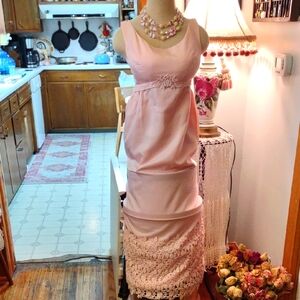 Elegant Pink Sleeveless Dress with Lace Detail